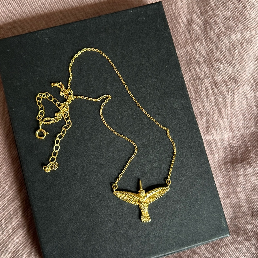 Gold hummingbird necklace